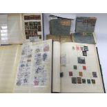 A stamp album containing two Victorian penny blacks, other Victorian stamps, later Edwardian and
