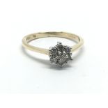 A 9ct gold seven stone diamond ring in the form of
