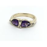 A 9ct gold amethyst and diamond ring, approx 3.2g