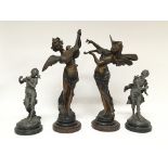 Two pairs of shelter figures of maidens with birds and fairies playing musical instruments