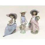 Another collection of three Lladró figures of ladies holding flowers
