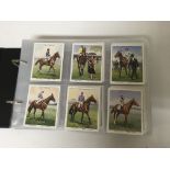 An album of cigarette card sets including Ogdens, Players, Churchmans etc