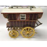 A well detailed model of gypsy caravan hand painted with fitted interior.