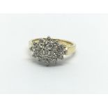 An 18ct gold diamond cluster ring, approx.54ct, ap