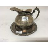 A 925 Silver presentation jug and conforming dish both made in Peru. weight 650g
