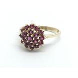 A 9ct gold ruby cluster ring, approx 2.9g and appr