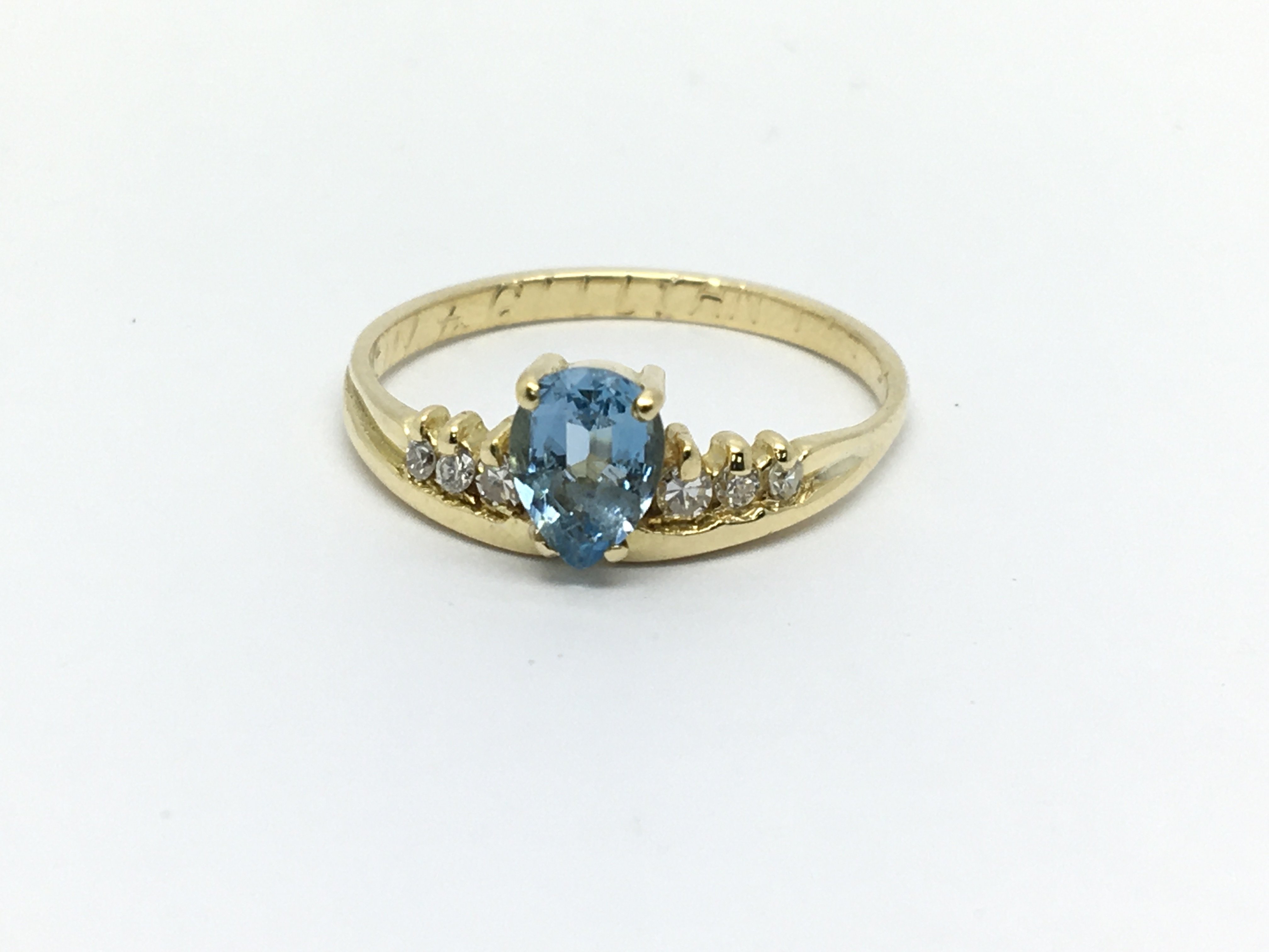 A 9ct gold aquamarine and diamond ring, approx 3.2