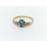 A 9ct gold aquamarine and diamond ring, approx 3.2