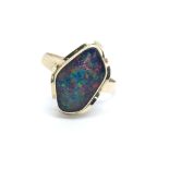 A 9ct gold black opal doublet ring, approx 2.7g an
