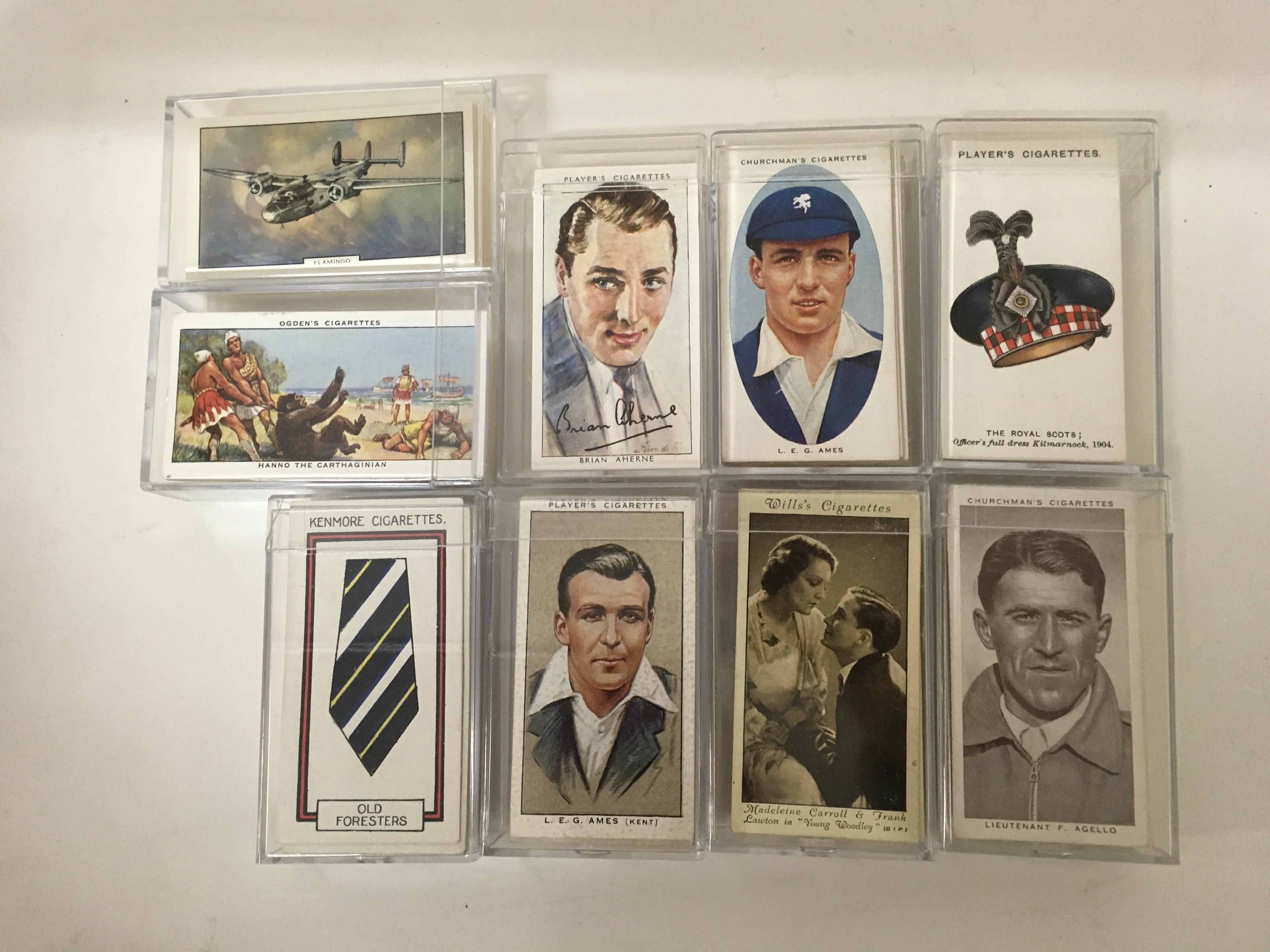 A collection of 9 sets of cigarette cards