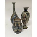 A Royal Doulton stone ware bottle vase damaged neck height 35cm one other similar art vase and
