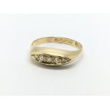 A vintage 18ct gold five stone diamond ring, appro