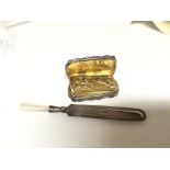 An Early Victorian silver and gilt vinaigrette and a silver bookmark (2)