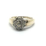 A 9ct gold diamond cluster ring in the form of a f