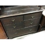 A late 18th century oak chest of drawers fitted with four short drawers and one long drawer.