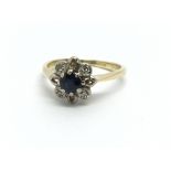 A gold sapphire and diamond ring, approx 1.9g and
