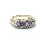 A 9ct gold amethyst and diamond ring, approx 2.2g and approx size M-N.