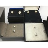 Four pairs of 9ct gold earrings.