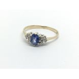 A 9ct gold Ceylon sapphire and diamond ring, appro