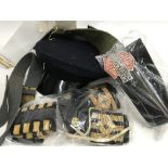 A bag containing costume items including Naval Epaulettes