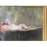 A framed picture depicting a reclining nude maiden
