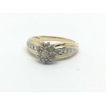 A 9ct gold diamond cluster ring, approx 2.8g and a