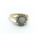 A 1930s 18ct gold opal and diamond cluster ring, a