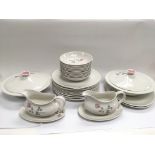 A Royal Doulton dinner service in Pillar Rose pattern.