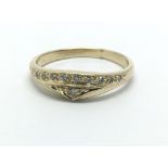 A 14ct gold diamond ring set with small diamonds, approx .15ct, approx 2.6g and approx size N-O.