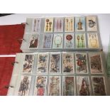 2 albums of part sets and mixed cigarette cards
