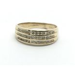 A 14ct gold three row diamond ring, approx 2.9g an