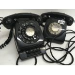 Two Vintage black telephones
