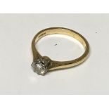 An 18carat gold ring inset with a solitaire diamond approximately 0.45 of a carat ring size O.