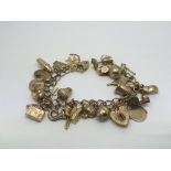 A 9ct gold charm bracelet, approx 31g