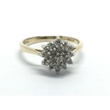 A 9ct gold diamond cluster ring, approx 1.6g and a
