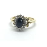 An 18ct gold sapphire and diamond cluster ring, ap