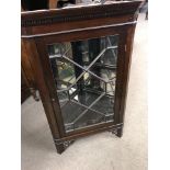 A Edwardian mahogany hanging corner cupboard the s