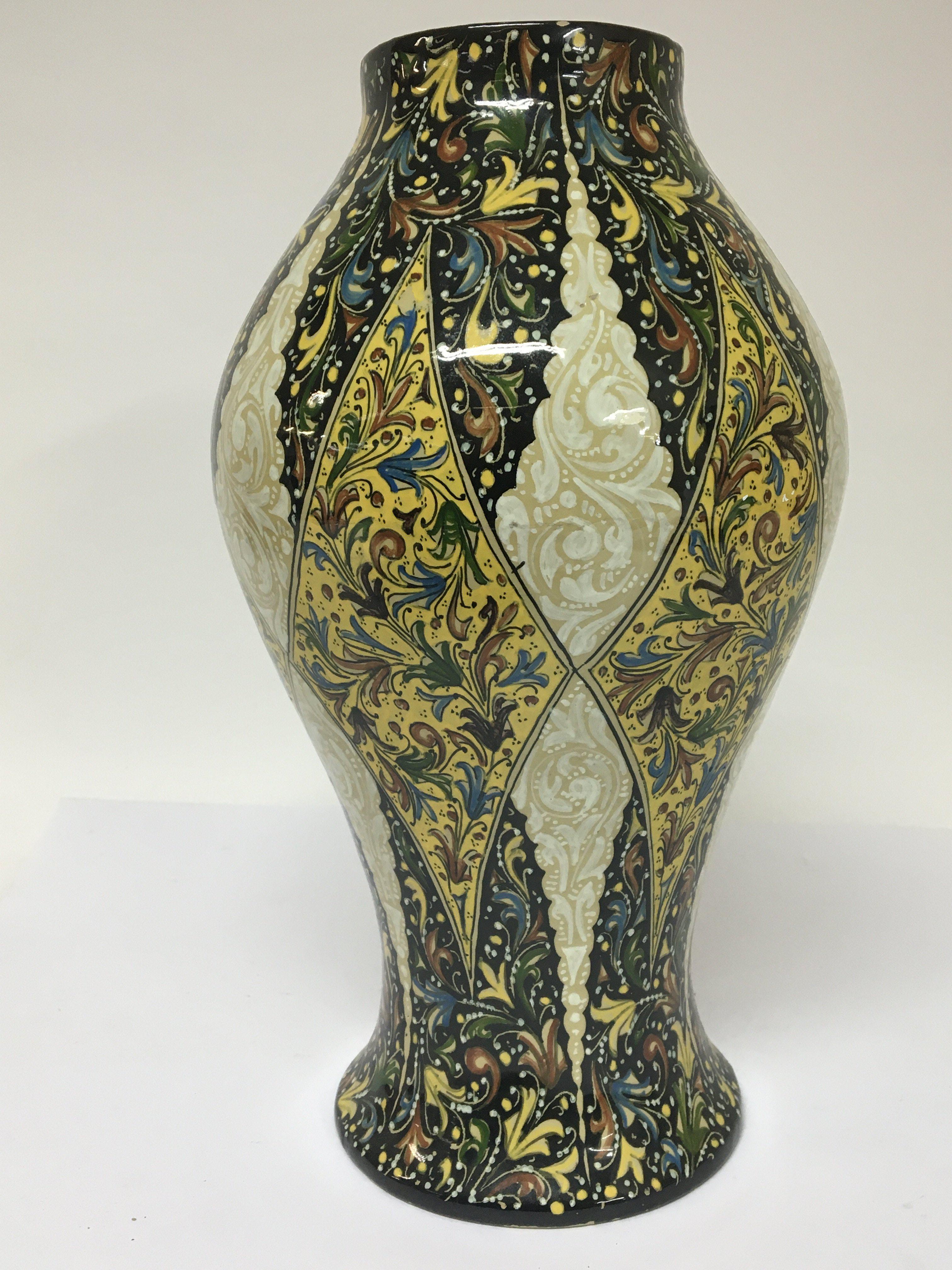 A decorative Italian ceramic vase by Molaroni Pesa