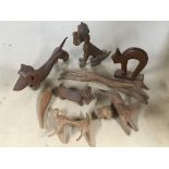 Seven New Zealand wooden animal carvings in the fo