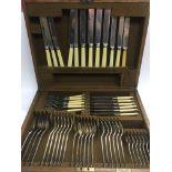 An oak cased canteen of Mappin & Webb cutlery.