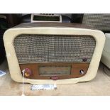 A vintage cream Bakelite Champion 860 model radio