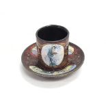 A small enamelled silver coffee can and matching s