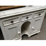A white painted pine late Victorian kneehole type