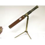 A 19th century telescope with a lacquered brass tr