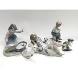 A collection of four Lladro figures including Inte
