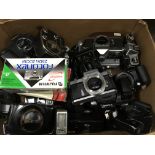 A collection of mixed SLR cameras etc... including