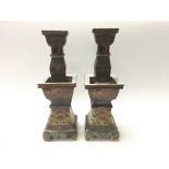A pair of Chinese porcelain candlesticks with cant