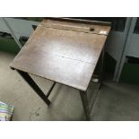 A vintage folding school desk.