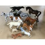 A collection of animal figures including Doulton a