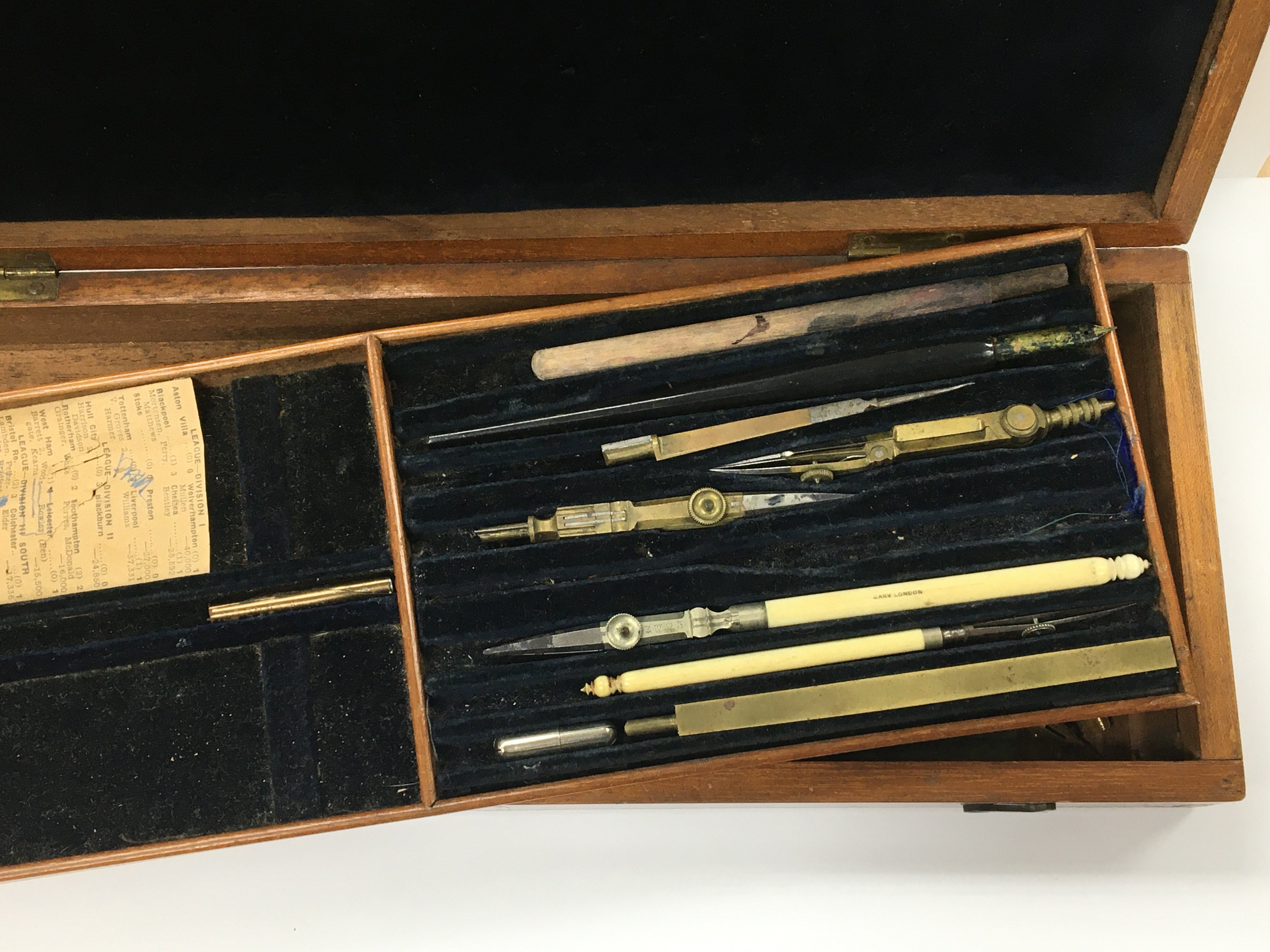 An antique mahogany cased draftsmans set with inse